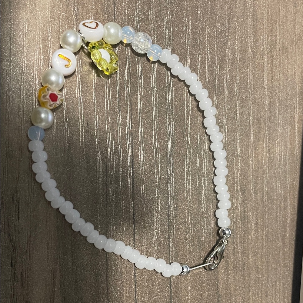Elegant White Beaded Bracelet with Silver Accents